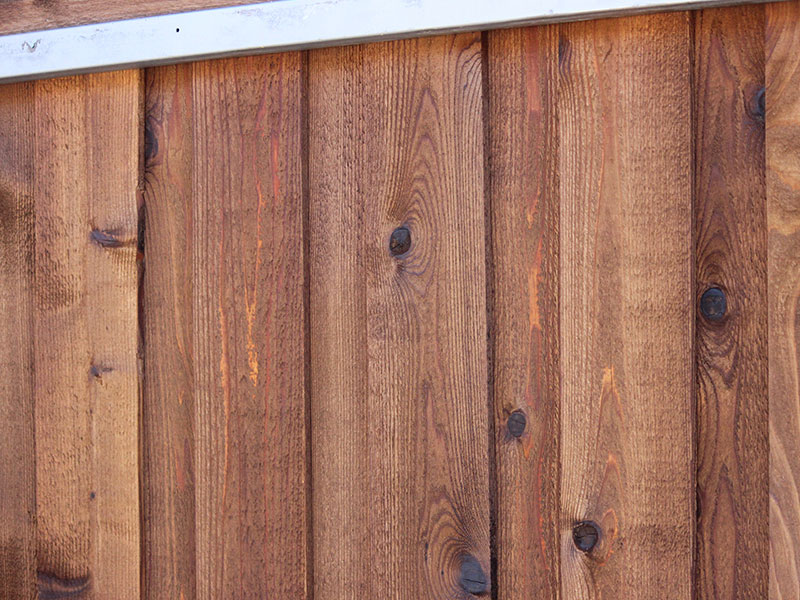 Professional patio fence installed  in Cobham to replace broken panels