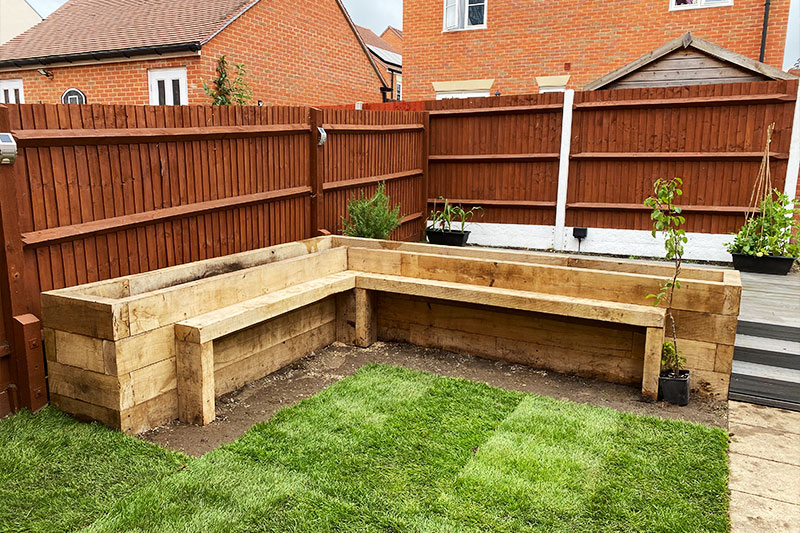 constructing-raised-bed-in garden-esher.jpg